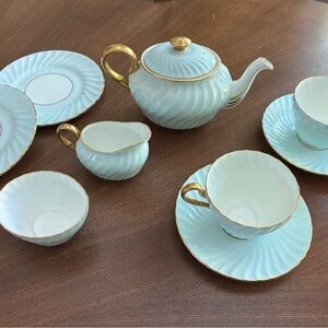 Cream and Gold Serveware Set with Elegant Dining Design